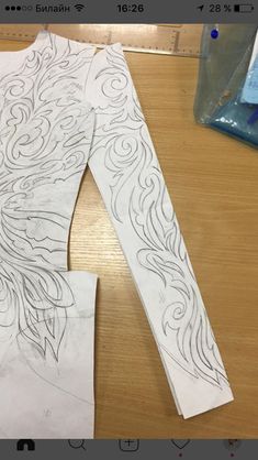 a piece of paper that has been cut out to look like a woman's body