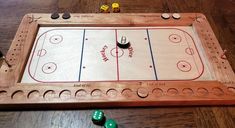 an ice hockey board with dices on the floor