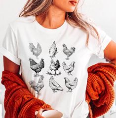 Discover our charming Vintage Chickens Shirt, perfect for every chicken enthusiast and farm aficionado! 🐔 This Chicken Lover Shirt is designed with a whimsy touch, making it an ideal pick for those weekends at the farm or casual outings. The Funny Chicken T-Shirt is not just an apparel choice; it's a conversation starter!  🌿 **Unique Features ✨ Delightful vintage print for that retro vibe ✨ Perfect for chicken lovers, farmers, and humor enthusiasts ✨ Versatile design suited for any casual occa Farm Chicken, Chicken Shirt, Farmer Shirt, Chicken Shirts, Funny Chicken, Time Tracking, Chicken Humor, Chicken Lovers, Unique Features