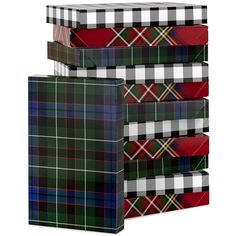 three boxes with plaid designs on them