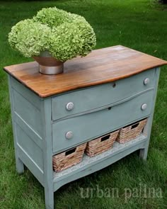 an old dresser is transformed into a planter