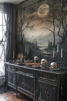 an old dresser is decorated with skulls and candles