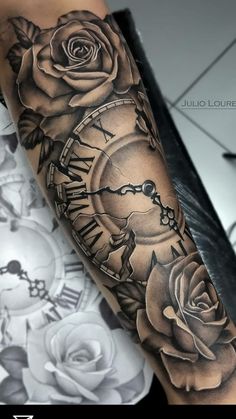 a clock and roses tattoo on the arm