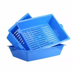 two blue plastic containers stacked on top of each other with dividers in the middle