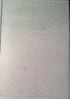 an image of a drawing on paper with lines and circles in the middle, as if it were cut out