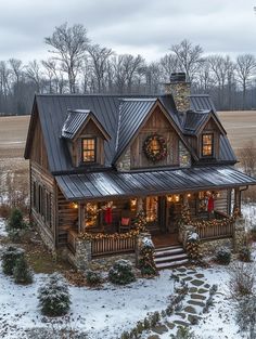 a house with christmas decorations on the front porch