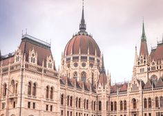 the large building has many spires on it's roof