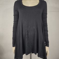 Ladies Long Sleeve Flared Waist Tunic Blouse / Shirt Free People Brand Size Small (Please Refer To Measurements Below) Black Brand New With Tags! No Flaws To Speak Of. Would Make A Great Gift! 97% Rayon, 3% Spandex Measurements Lying Flat: Bust (Pit To Pit): 16.5 Inches. Length (From Nape Of Neck To Bottom Hem): 28.5 Inches. Long Sleeve Lagenlook Top, Stretch Viscose Long Sleeve Tops, Long Sleeve Lagenlook Tops For Layering, Black Long Sleeve Top For Layering, Fitted Long Sleeve Lagenlook Blouse, Fitted Lagenlook Long Sleeve Blouse, Long Sleeve Viscose Blouse For Layering, Lagenlook Tops For Fall Layering, Viscose Long Sleeve Blouse For Layering