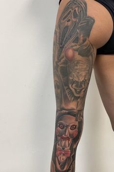 a person with a tattoo on their leg and some clowns behind them, all in different colors