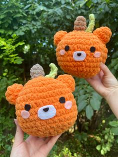 two crocheted stuffed animals in the shape of bears with horns on their heads