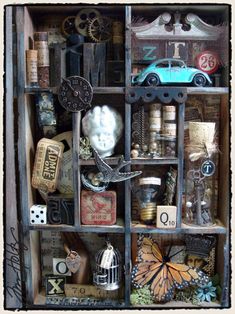 a book shelf filled with lots of assorted items