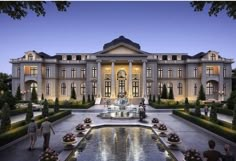 an artist's rendering of the exterior of a mansion with fountain and people walking in front