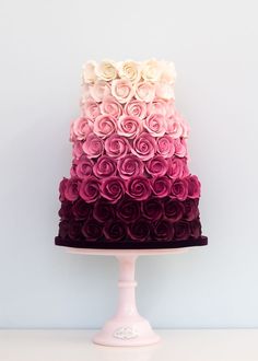 a multi - tiered cake with roses on top is featured in the magazine's cover