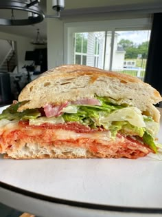 a large sandwich sitting on top of a white counter