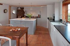 the kitchen is clean and ready to be used as a dining room or family room