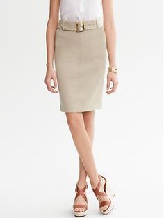 Belted Safari Skirt Formal Fitted Skirt With Belt Detail, Belted Fitted Mini Skirt, Fitted Skirt With Banded Waist, Fitted Belted Mini Skirt, Chic Office Skirt With Belt Detail, Fitted Mini Skirt With Belt, Elegant Mini Skirt With Belt Detail, Classic Belted Skirt For Workwear, Classic Belted Office Skirt