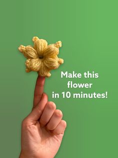 a hand that is holding a flower in front of a green background with the words make this flower in 10 minutes