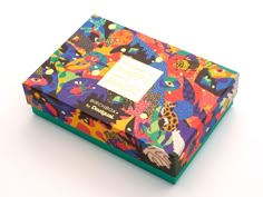 a colorful box with an image of cats on it