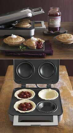 an electric oven with pies in it on a table