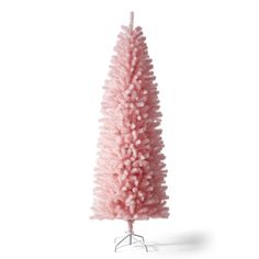 The pencil tinsel tree brings a whole new dimension to your seasonal decorating scheme. This tinsel tree with a matching stand is perfect for display in corners or areas with limited floor space. Set up is quick and easy allowing you to enjoy a decorative piece that will shine and sparkle. The Holiday Aisle® Size: 7.5ft The Holiday Aisle® Pink Pencil Tinsel Artificial Christmas Tree | Size 7.5ft | AllModern Unlit Christmas Trees, Pencil Trees, Pink Pencil, Tinsel Tree, Christmas Origami, Christmas Tree Shop, Pink Home Decor, Pink Trees, New Dimension