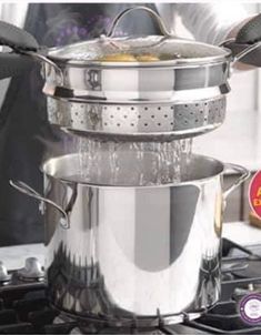 a person is cooking on the stove with pots and pans stacked on top of each other