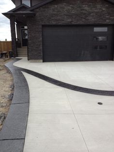 a house with a driveway in front of it