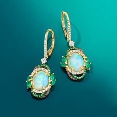 Ross-Simons - Opal Drop Earrings, .64ct t. w. Multicolored Diamonds, .70ct t. w. Multi-Gemstones. Our dreamy drop earrings call to mind the kind of lush greenery found in nature's most enchanting hideaways. Featuring 8x10mm oval opal cabochons that are encircled by artful borders of .64 ct. t. w. brown and white diamonds and .20 ct. t. w. tsavorite rounds with fanciful marquise emeralds that total .50 carats. Set in polished 14kt yellow gold. Hanging length is 1 3/8". Black rhodium at brown diam Opal Drop Earrings, Emerald Birthstone, May Birthday, Lush Greenery, Brown Diamond, Black Rhodium, White Diamonds, Diamond White, Borders