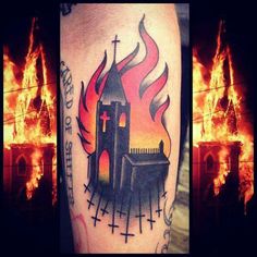 a tattoo on the leg of a man with flames in the background and an image of a church on fire