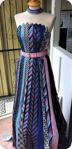 a dress made out of ties on a mannequin