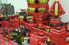 a large lego castle made out of red bricks