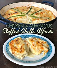 chicken and asparagus stuffed shells with alfredo sauce in a blue dish on a wooden table