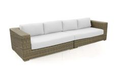 an outdoor sofa with white cushions