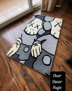 an area rug is on the floor in front of a sliding glass door that says, noor decor rugs