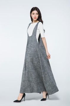 Summer is on its way…so get ready to relax with this casual, comfortable long gray linen pinafore dress, ideal for those long lazy, hazy summer days. The generous loose-fitting casual style in breathable linen, will soon become not only your wardrobe staple, but a go-to everyday dress that you won’t want to take off!  Pleated to enhance the coolness of the linen, in classic pinafore style, this handmade designer linen dress is made for you to combine it with whatever you wish, whenever and wh... Womens Pinafore Dress, Plus Size Long Dresses, Mode Kimono, Tunic Designs, Maxi Outfits, Linen Dress Women, Long Linen Dress, Dress Linen, Apron Dress