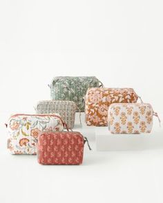 Take your favorite quilts on the road (and into your bathroom) with our cosmetic bags. Perfect to store everyday toiletries and travel necessities, cast in vintage-inspired prints, with channels, a printed flange, and a surprise lining. A lovely gift for yourself and your friends. — Zip closure — Side gussets — Add monogramming for a personal touch — Imported — 100 cotton, including the fill — Machine wash — Set of two includes one large and one small bag — Large bag: 5 1/2 H x 8 1/2 W at top; Colorful Shower Curtain, Cosmetic Bag Set, Travel Necessities, Small Cosmetic Bags, Jewelry Roll, Garnet Hill, Market Tote, Soft Rug, Toiletry Bags