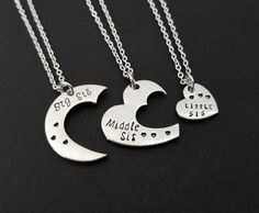 Three Personalized Sister Necklaces!  Three charm necklaces printed with "Big Sis" "Middle Sis" and "Little Sis" on bright silver chains make the perfect gift for you and your sisters.  The sister charms are made from zinc alloy and measure 26mm x 23mm (Big Sis), 24mm x 25mm (Middle Sis),  13mm x 14mm (Little Sis).  The chain is silver plated and measures 16" or 18" with a 1" extender.  Each necklace arrives in its own box.  To add additional initial discs, birthstone charms, and other accents t Sister Necklaces, Necklaces Big, Chef Necklace, Big Sister Necklace, Aesthetic Jewellery, Trio Necklace, Middle Sister, Bff Jewelry, Cd Crafts