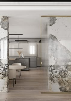 the interior of an apartment with marble walls and flooring