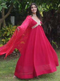 Introducing the enchanting pink embroidered georgette festival wear gown, a stunning addition to your ethnic wear collection. This gown features intricate zari sequin work and embroidered details that add a touch of glamour and elegance. The gown comes in a beautiful pink color that is perfect for festivals, events, receptions, or any special function.
The key features of this gown include a fully stitched design, available in sizes ranging from XS to XXL, a 3.5-meter flair, and a gown length of Floor-length Gown With Gota Work For Eid, Floor-length Gota Work Dresses For Diwali, Navratri Floor-length Dresses With Gota Work, Floor-length Gota Work Dress For Reception, Floor-length Kurta With Gota Work, Eid Gown With Gota Work In Georgette, Diwali Maxi Dress With Gota Work, Maxi Length Traditional Wear In Georgette With Gota Work, Reception Gown With Gota Work, Floor-length