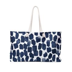 Our Indigo blue and white Beach Tote Bag is perfect for a day at the beach or in town. This wide-mouthed, durable bag holds a generous amount of personal items and is easily held by its thick rope handles. One size: 24" x13" (60.9 cm x 33 cm) 100% Spun Polyester T-bottom Cream sheeting interior lining Assembled in the USA from globally sourced parts   24" × 13" Length, in 24.02 Height, in 12.99 Width, in 5.51 Handle height, in 11.42 Trendy Blue Beach Bag With Large Capacity, Blue Bucket Beach Bag With Adjustable Strap, Blue Bucket Bag For Beach Season, Large Capacity Blue Bucket Beach Bag, Blue Rectangular Weekender Bag For Travel, Blue Rectangular Beach Bag For Travel, Blue Bucket Bag For Beach, Casual Blue Beach Bag With Large Capacity, Blue Tote Beach Bag For Travel