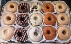 there are many different types of donuts in the tray