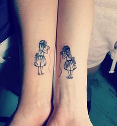 two girls with matching tattoos on their arms