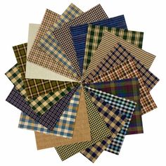 a bunch of different colors and patterns of fabric