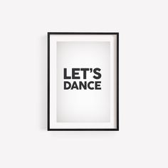 a framed poster with the words let's dance in black and white on it