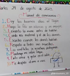 a white board with writing on it in spanish