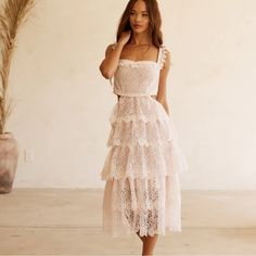 New! The Alana Lace Dress By Btb Los Angeles Comes In The Palest Shade Of Pinkcalled Petal. Constructed Of The Most Delicate Of Laces It Creates An Ethereal Silhouette. Perfect For Any Special Occasion Or Simply Adding A Touch Of Elegance To Your Everyday Wardrobe Enjoy All-Day Wear With Ease In This Luxe And Timeless Style. Length: 53.5 (Xs), 54 (S), 54.5 (M), 55 (L), 55.5 (Xl) Bust: 38 (Xs), 40 (S), 42 (M), 44 (L), 46 (Xl) Feminine Tiered Lace Dress, Chic Tiered Lace Summer Dress, Chic Summer Tiered Lace Dress, Feminine Tiered Lace Midi Dress, Sleeveless Lace Dress With Ruffles For Brunch, Feminine Lace Midi Dress For Day Out, Chic Sleeveless Lace Dress For Brunch, Tiered Lace Dress For Brunch, Long Sequin Dress