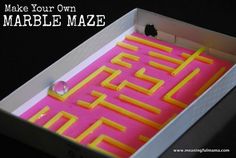 a pink and yellow maze in a box with the words make your own marble maze