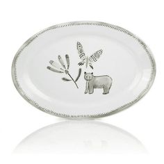 a white plate with an animal on it