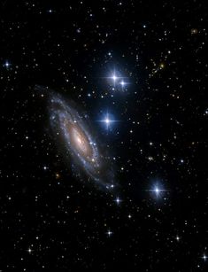 an image of a spiral galaxy in the sky