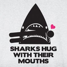 a t - shirt that says sharks hug with their mouths