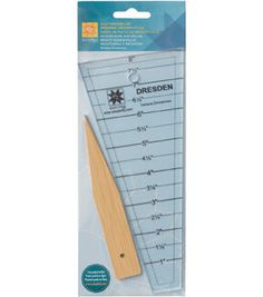 a wooden ruler with the measurements on it's side and an adhesivee for measuring